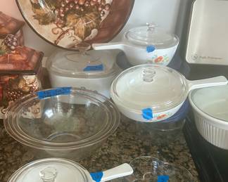 Corning ware handled vintage two-piece sets $10 each; blue & white covered casserole dish , one and a half quart and 2 quarts clear bowls set $30