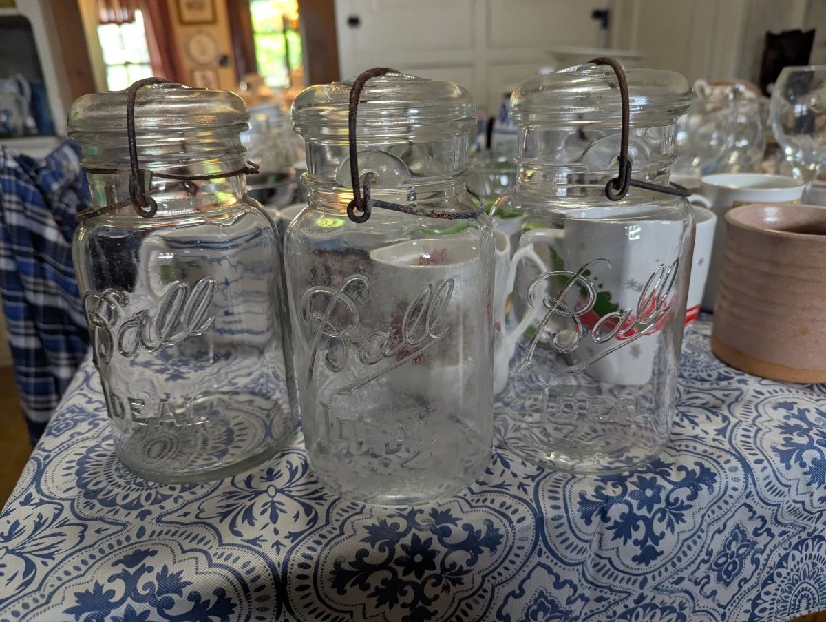 Many mason jars from early 1900s