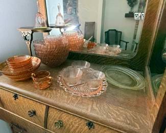 pink dishes and yellow serving tray