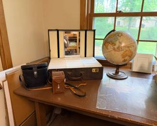 Camera, binoculars, eyeglass display/travel case, world globe