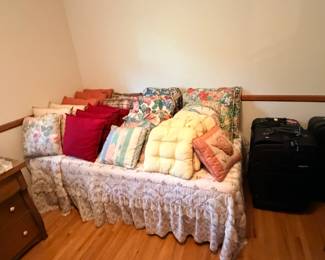 Twin bed frame, linens, throw pillows, suitcases