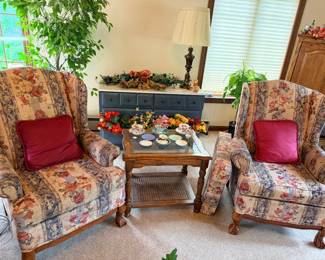 Tea cups and saucers, dresser, indoor plants, silk flowers, tv armoire