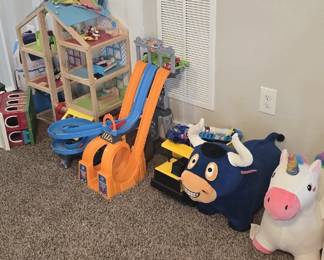 Toys: trucks, animal bouncers, Little Tykes Race track