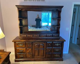Master bedroom set: High quality American colonial/early American style. Dark walnut finish, brass hardware throughout, very well made and all matching. $650 for the whole set **Nightstands (2) - gallery top, brass hardware, 3 drawers - $75 each or $125 for the pair.28"wide x 3' tall **Armoire - double door upper cabinet, 4 drawers below, beautiful proportions $200. 40" wide x 5' tall **Queen headboard/bed frame - turned ball post, classic colonial style $100. 5' long **Dresser with mirror - massive piece, 9+ drawers, center cabinet, hutch mirror with shelves -$250. Dresser 69" long32" high.Mirror on top is 44"tall x59" wide