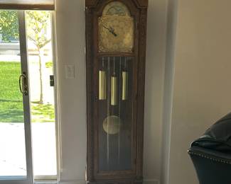 $350 a beautiful grandfather clock with an ornate brass moon phase dial face, triple chime tubes, pendulum, carved oak case. Key is missing, believe to be working. These are heavy and delicate to move. Mention in the listing that the buyer is responsible for proper transport and that chime tubes and pendulum will need to be removed for moving. Condition: great Dimensions: 6'tall