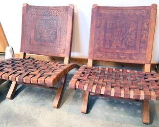 Pair of wood + hand-tooled leather chairs attributed to Angel Pazmino (Ecuador) c. 1960s-70s