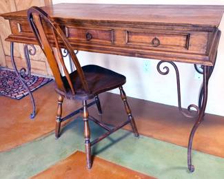 Large desk with wrought iron legs