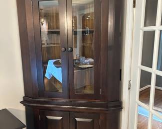 Dark cherry corner cabinet. Newer