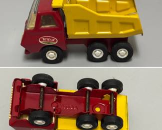 A vintage Tonka Mini dump truck from the 1960s or 1970s, featuring a red cab and yellow dump bed