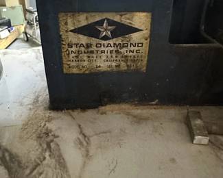 Closeup of stone cutting saw and polishing bench. Saw made by Star Diamond Industries, Inc.