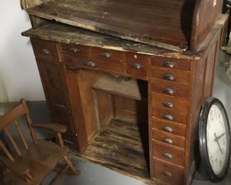 Definitely a project for restoration, antique rolltop, many drawers