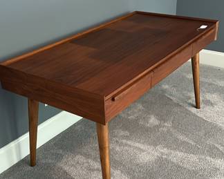 F55 - $650. Crate & Barrel "Tate" Desk. Measures 5' long x 30" deep x 30" tall. Solid Walnut & Walnut Veneer. Integrated Power Strip with 2 USBs and 2 - 3 prong outlets. Still on website. Excellent condition!