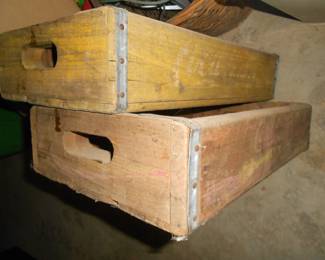 Dozens of vintage Coca Cola wooden cartons