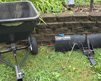 Fertilizer spreader and blade