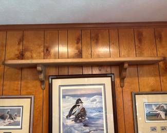 Showing the shelf above the duck pictures that is for sale.