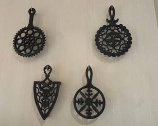 Set of Four Vintage Cast Iron Trivets