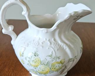 White Pitcher Yellow Roses