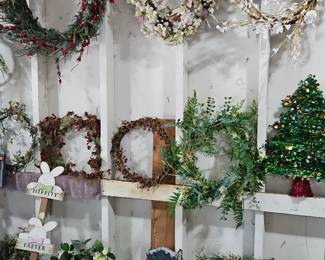 Assorted Decorative Wreaths and Christmas Tree