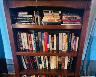 Solid wood, bookshelf, and assorted titles