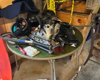 Sports equipment and golf balls