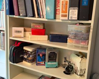 Sewing counter, cross, stitch books, bookcase