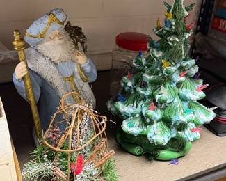Santa and ceramic Christmas tree lighted