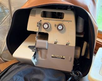 Serger, sewing machine