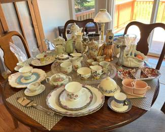 Teacups, porcelain and crystal pieces, 