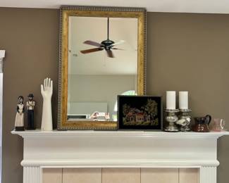 Arm sculpture, wall mirror framed