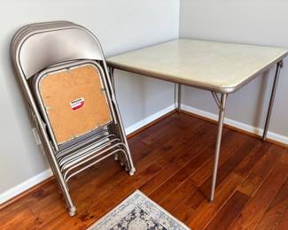 Folding table with four chairs
