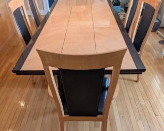 Dimensions : 72" long x 42"x 30"H. Each leaf is 17 3/4" wide. Matching china cabinet also for sale. Table and chairs are in very good condition. Birdseye Maple veneer with Glossy finish.
