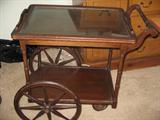 Very old tea cart, 3 wheels. Too cute