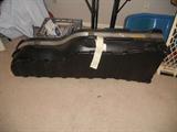 This is a travel case for golf clubs