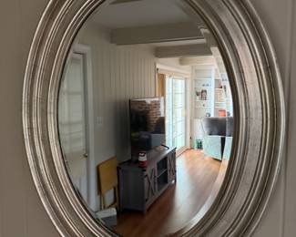 Silver framed  oval wooden mirror 