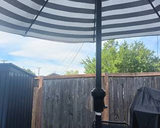 Black and white umbrella, black patio table