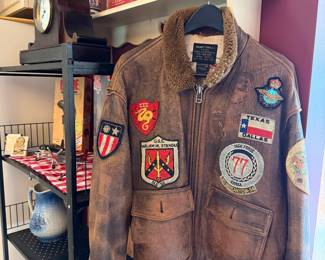 patches on a vintage bomber jacket