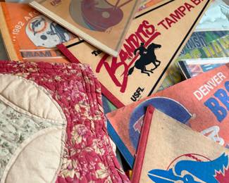 large collection of felt and paper banners