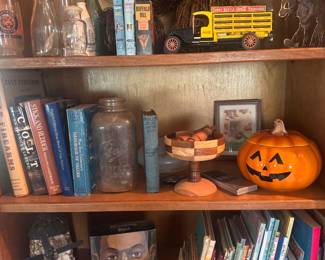 Milk bottles, pumpkins and books