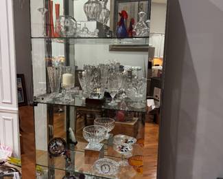 Polished metal and Glass display cabinet with Some of the Waterford Crystal