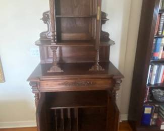 Antique hand carved buffet opened up