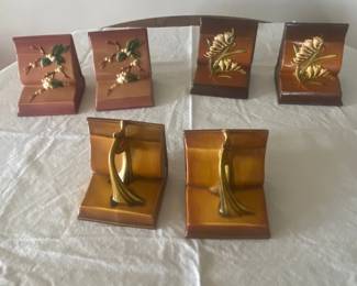 Roseville bookends  Pinecone, Freesia and Snowberry