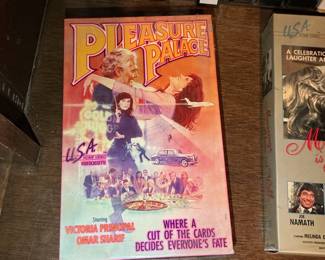 Collection of VHS Tapes and John Wayne Box Set