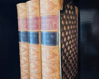 Antique books, brass bookends