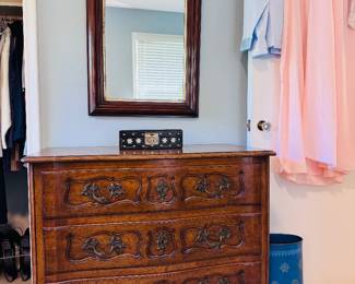 Matching Kindel Grand Rapids warm wood three drawer dresser, wood frame arched wall mirror