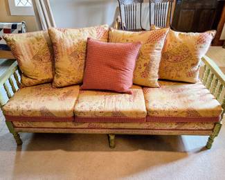 Spindle style sofa with cane back in the guest house