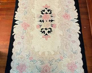 Several area rugs in the main house