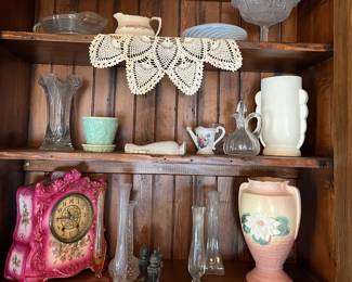 Porcelain clock, flower vases, and pottery in the main house