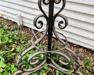 Wrought iron floor lamp in garage