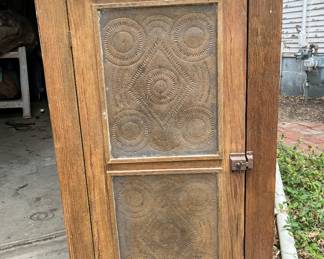 Antique cupboard/pie safe in garage