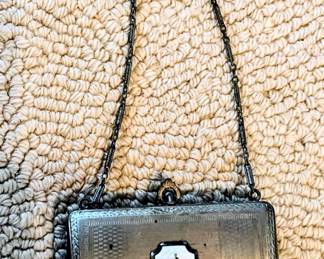 Antique metal cosmetic purse in main house